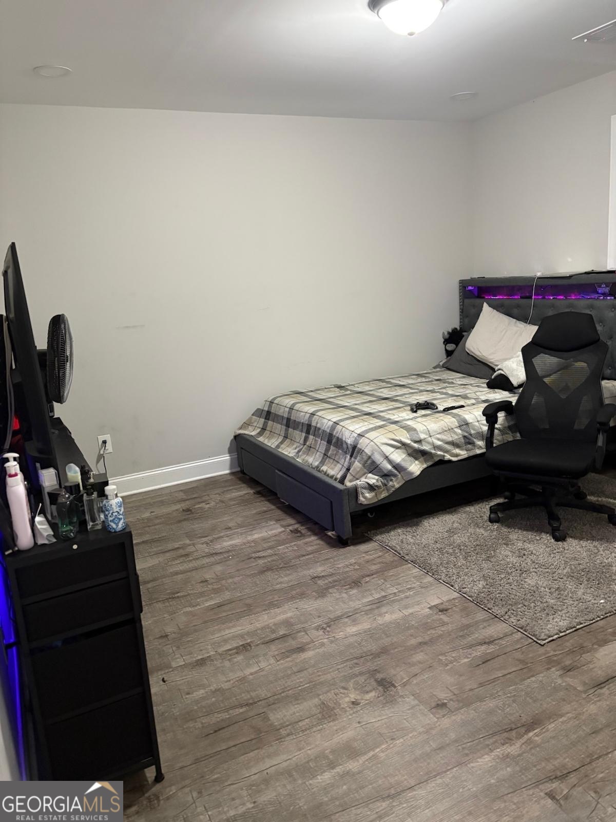 606 Old River Road Cornelia, GA 30531 - Photo 25 of 27 a bedroom with a bed and a desk