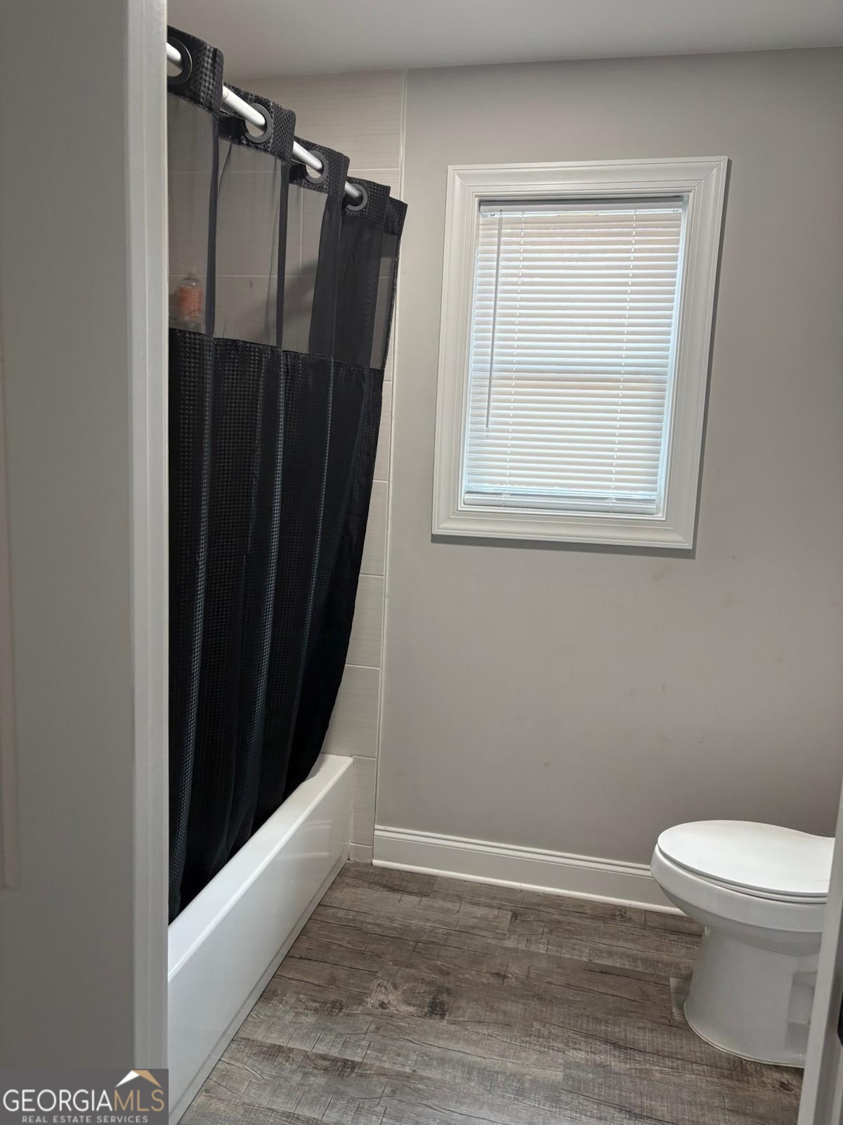 606 Old River Road Cornelia, GA 30531 - Photo 27 of 27 a bathroom with a sink and a toilet