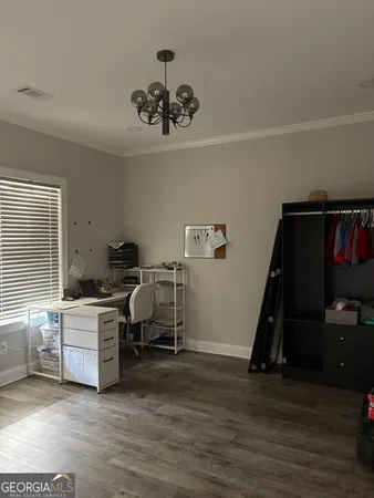 a view of a room with a workspace