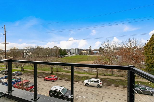 a view of a balcony with city view