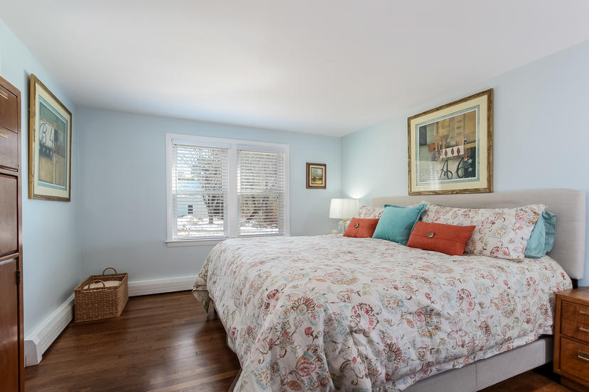 37 Maureen Road Centerville, MA 02632 - Photo 7 of 18 a bedroom with a bed and wooden floor