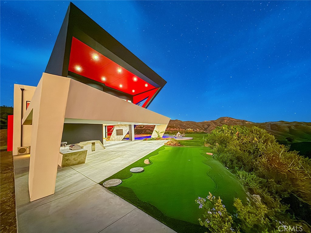 2514 Cayman Road Malibu, CA 90265 - Photo 14 of 73 a view of an outdoor space and a yard