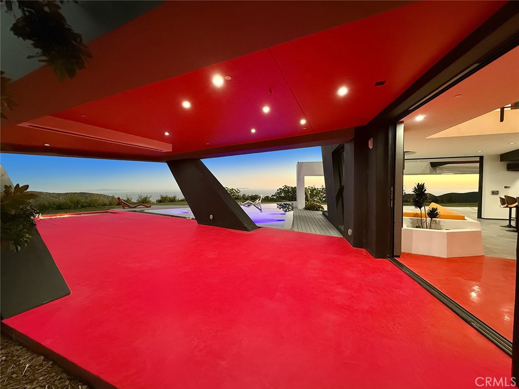 2514 Cayman Road Malibu, CA 90265 - Photo 15 of 73 a large room with pool table and large windows
