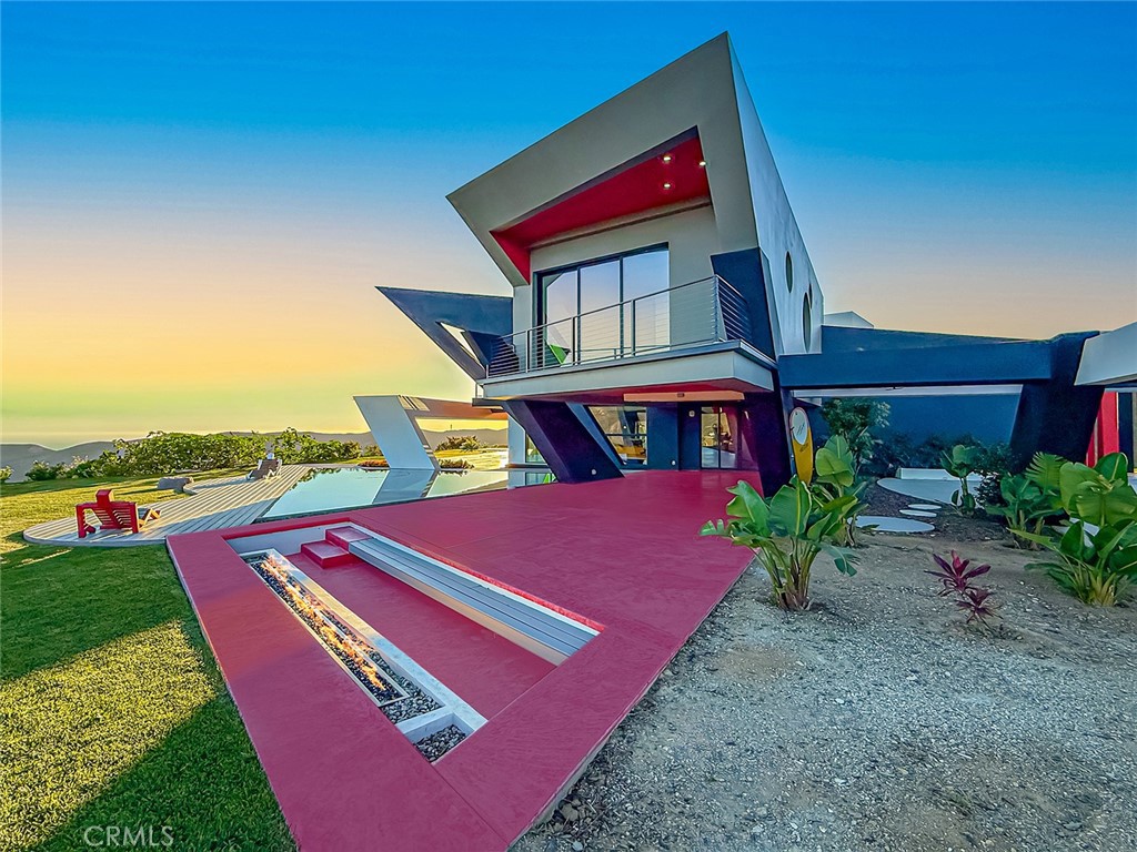 2514 Cayman Road Malibu, CA 90265 - Photo 56 of 73 a front view of a house with a yard