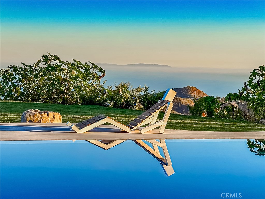 2514 Cayman Road Malibu, CA 90265 - Photo 6 of 73 swimming pool with trees in the background