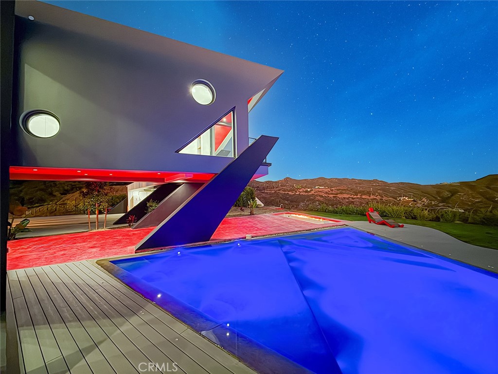 2514 Cayman Road Malibu, CA 90265 - Photo 9 of 73 a view of an outdoor space and front view of a house