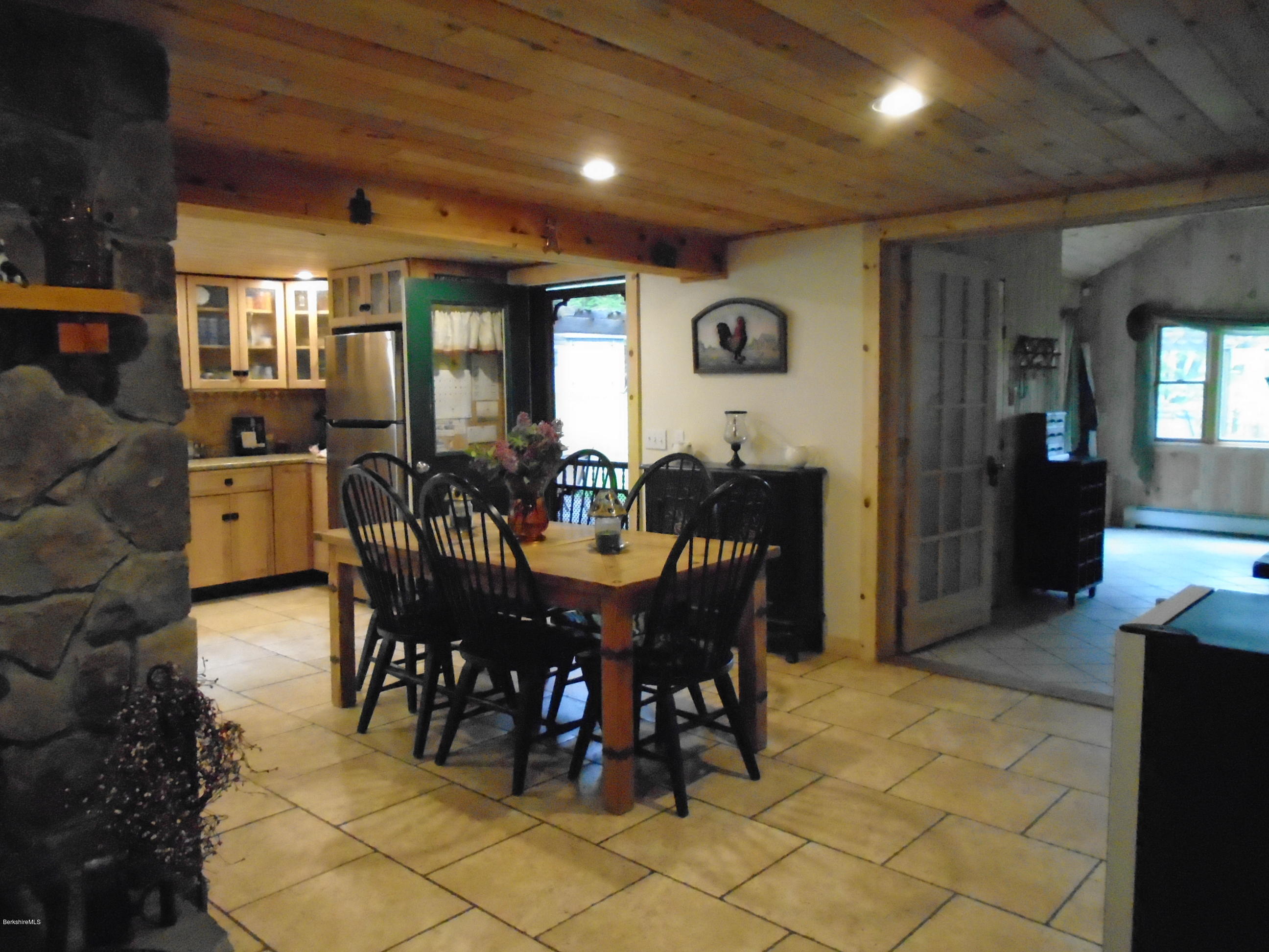1350 South Main Road Otis, MA 01253 - Photo 17 of 56 a view of a dining room with furniture