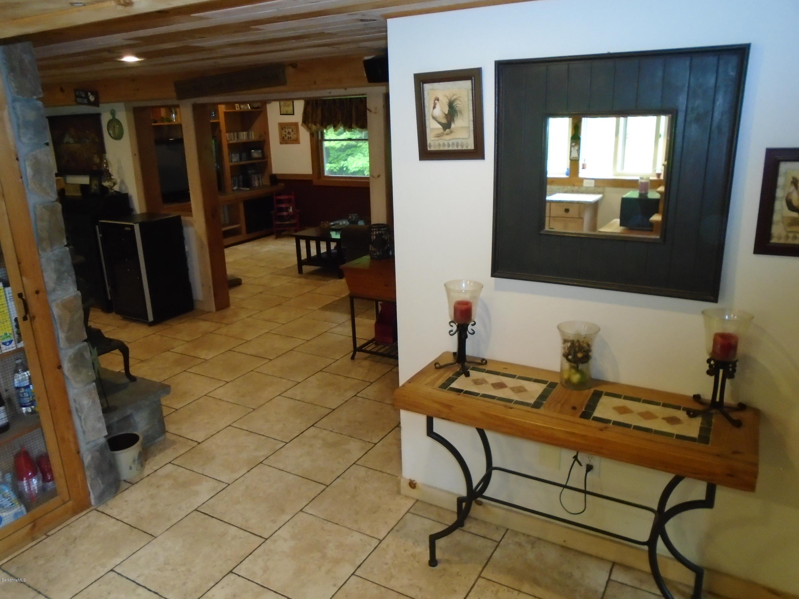 1350 South Main Road Otis, MA 01253 - Photo 21 of 56 a view of a workspace with furniture and a window