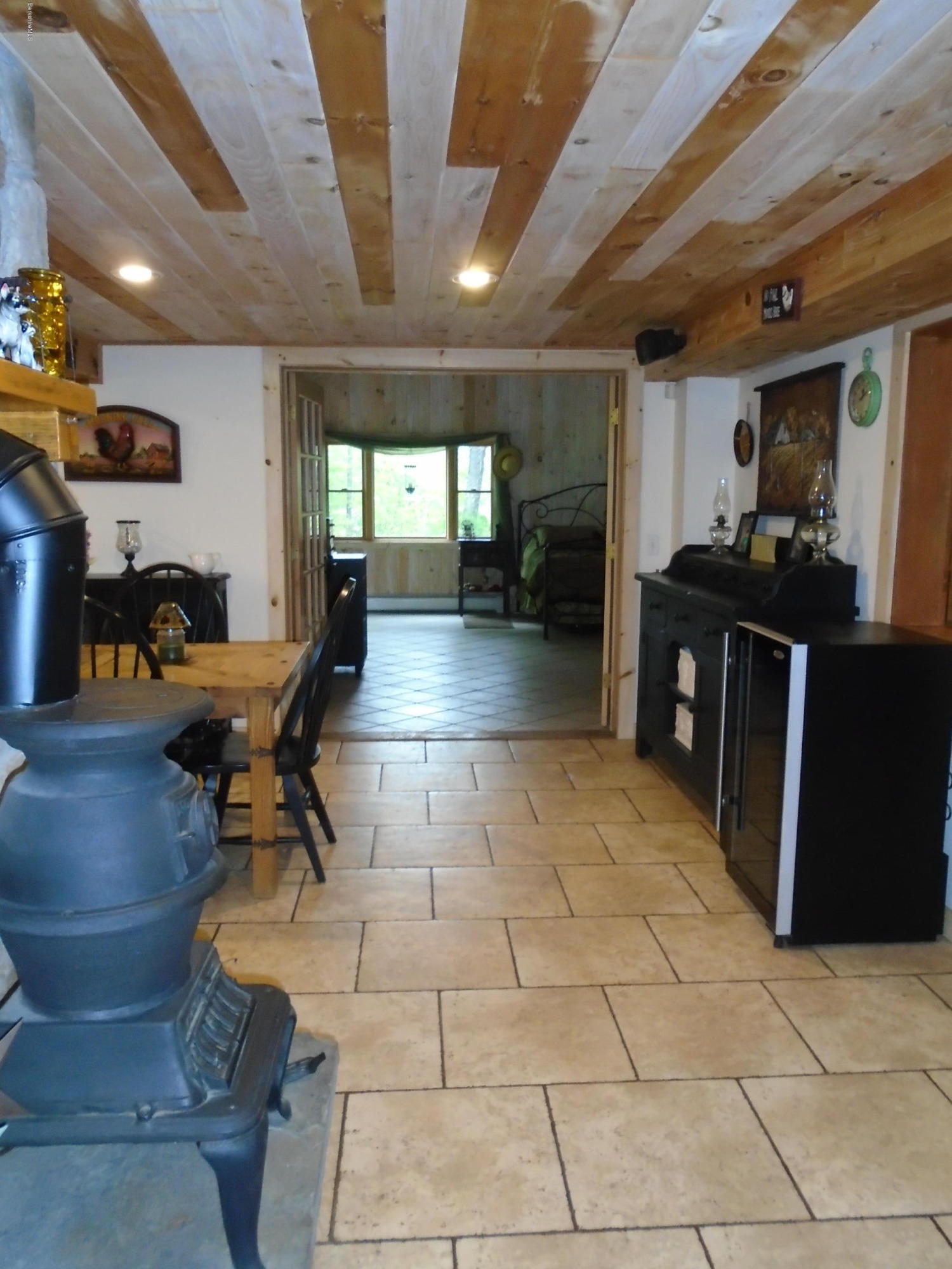 1350 South Main Road Otis, MA 01253 - Photo 25 of 56 a lobby with furniture and wooden floor