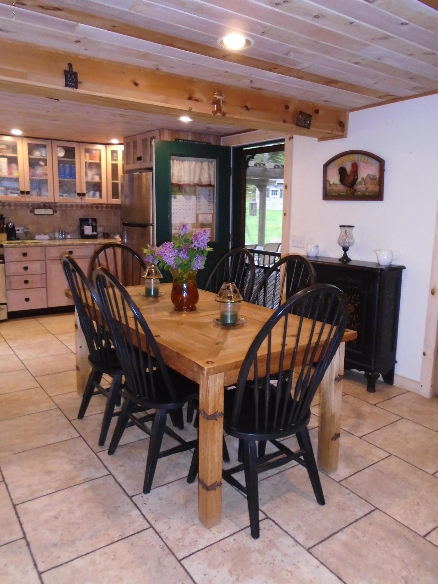 1350 South Main Road Otis, MA 01253 - Photo 26 of 56 a view of a dining room with furniture
