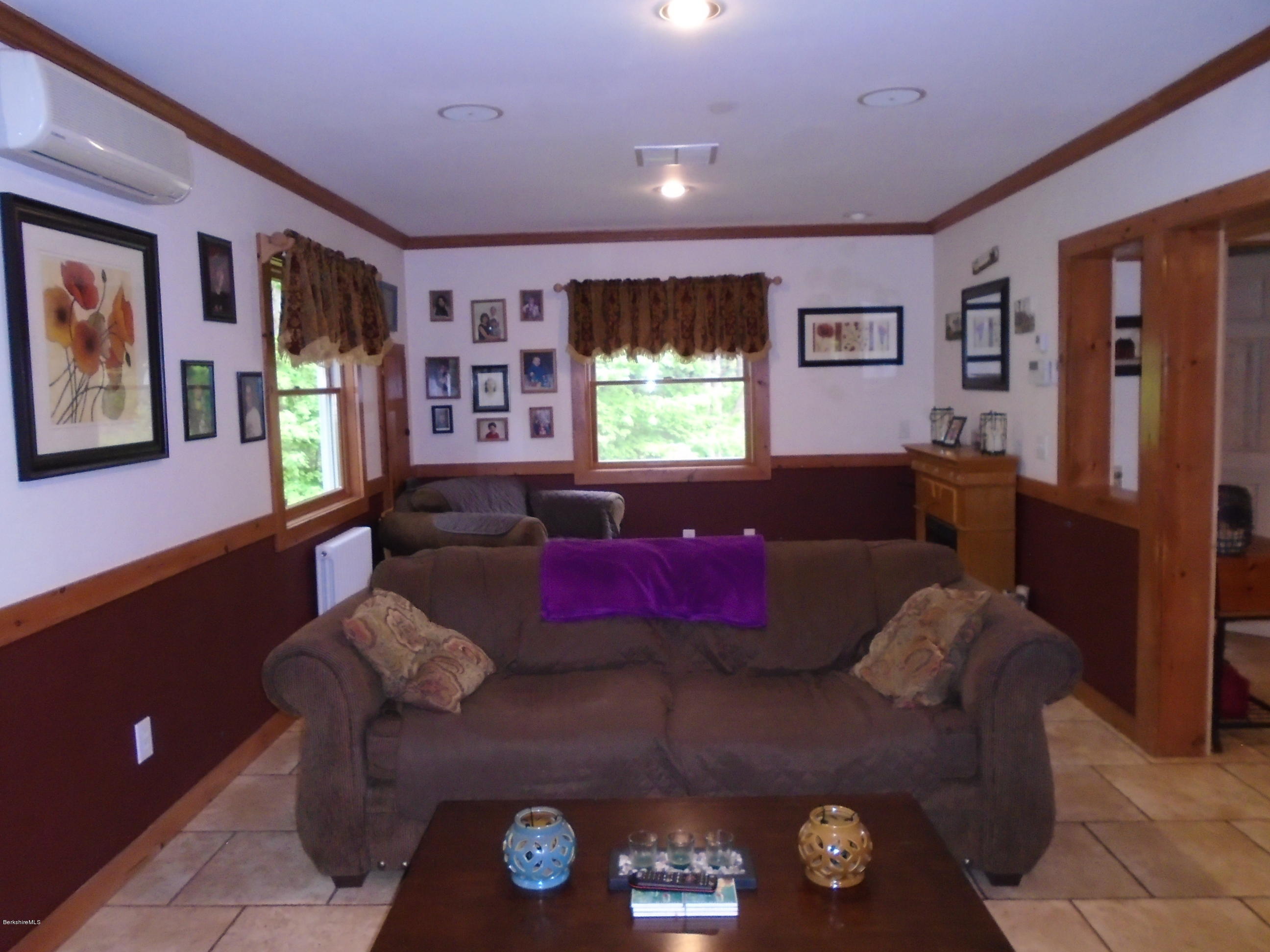 1350 South Main Road Otis, MA 01253 - Photo 28 of 56 a living room with furniture and a window