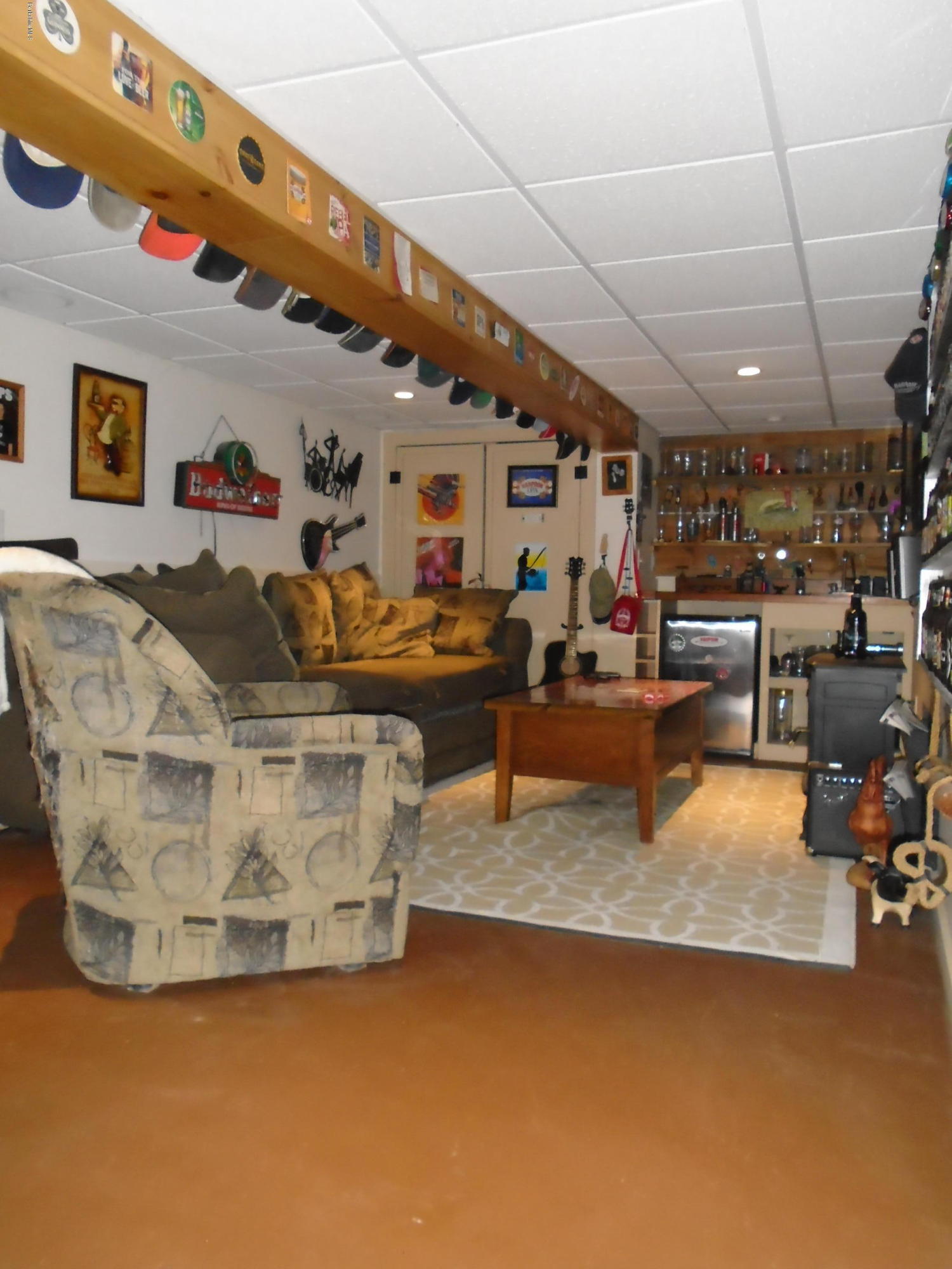 1350 South Main Road Otis, MA 01253 - Photo 38 of 56 a living room with furniture and a flat screen tv