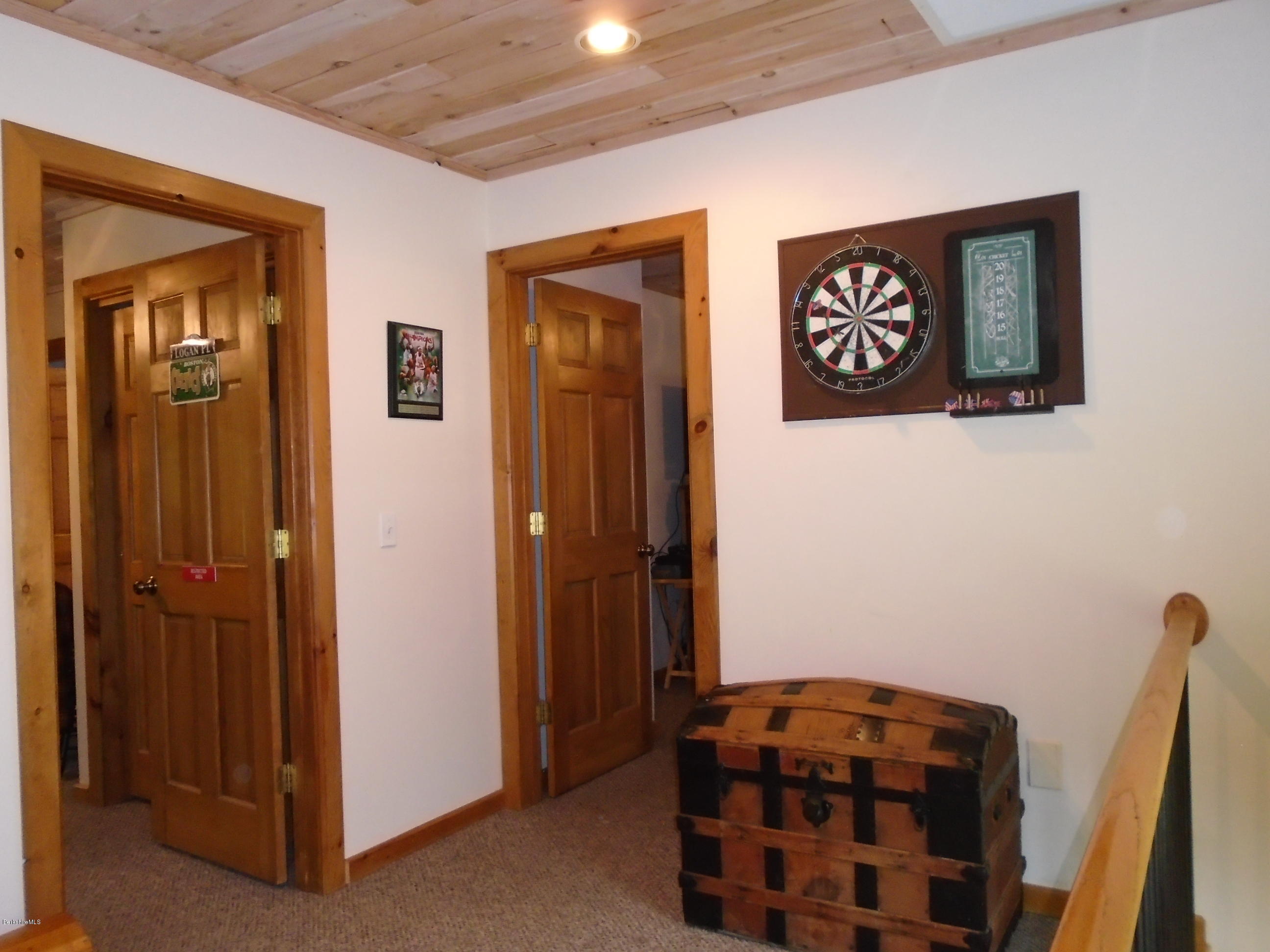 1350 South Main Road Otis, MA 01253 - Photo 39 of 56 a bedroom with a bed and a closet