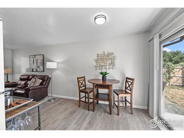 a bedroom with a bed and a potted plant
