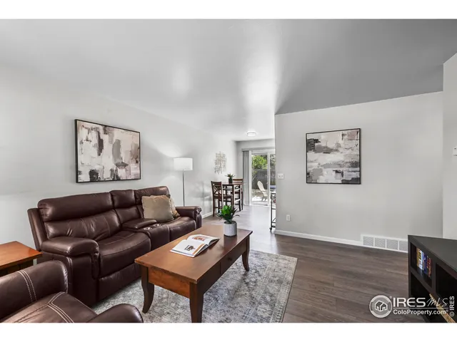 a kitchen with a sink cabinets and window