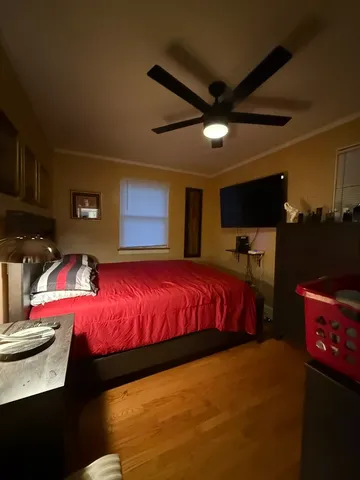 a bed room with a bed and a lamp