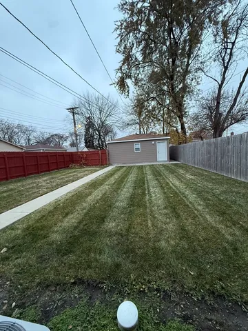 a view of outdoor space and yard
