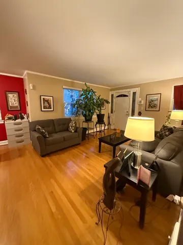 a living room with furniture and a couch