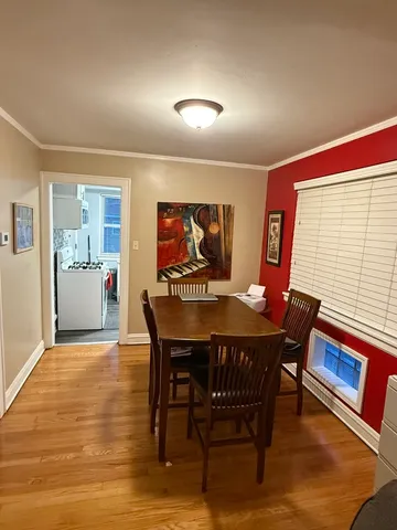 a view of a dining room with furniture