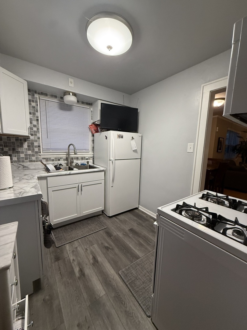 2610 West 80th Street Chicago, IL 60652 - Photo 9 of 27 a room with storage and utility