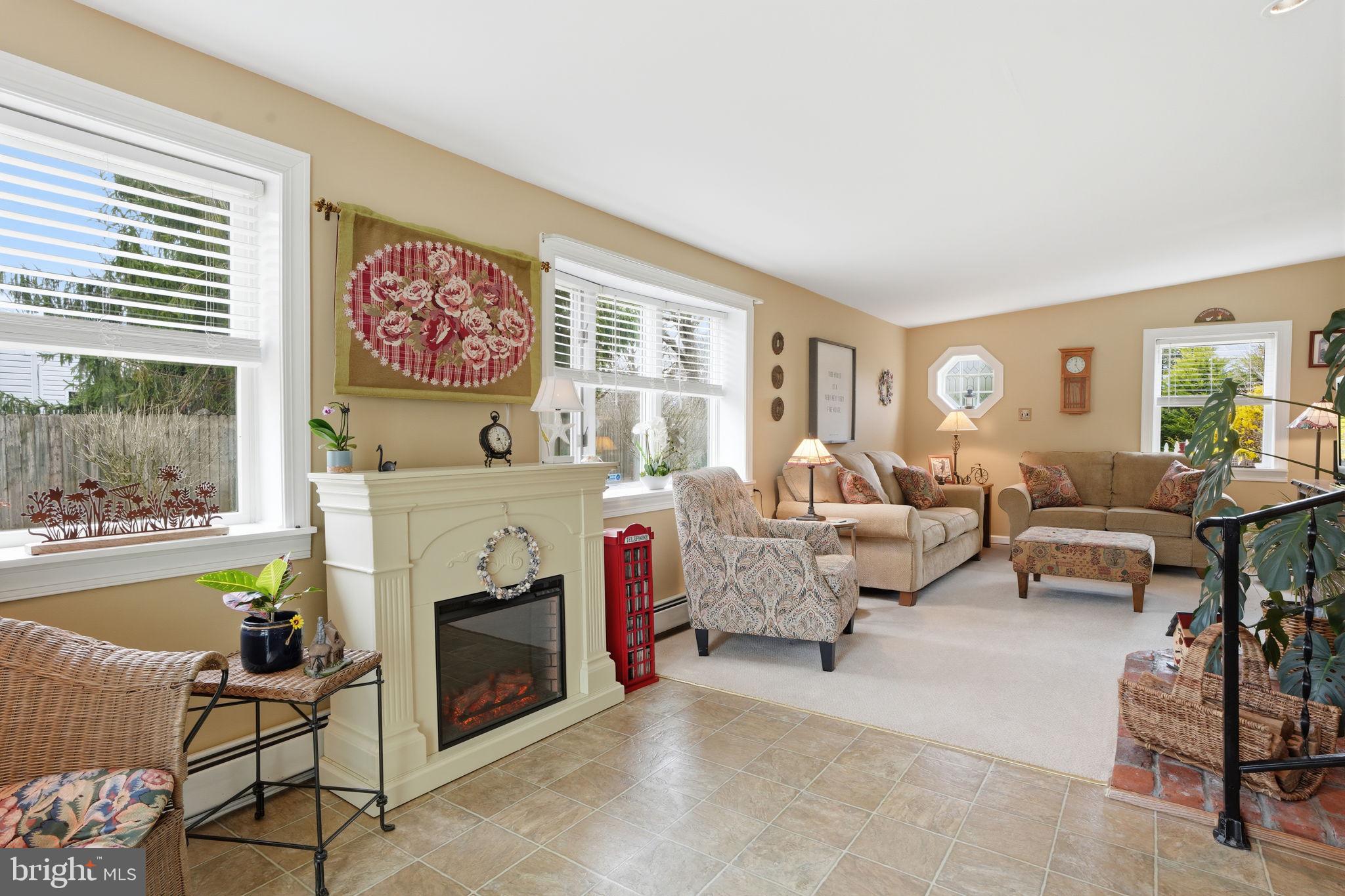 211 Longview Avenue Langhorne, PA 19047 - Photo 22 of 62 a living room with furniture and a fireplace