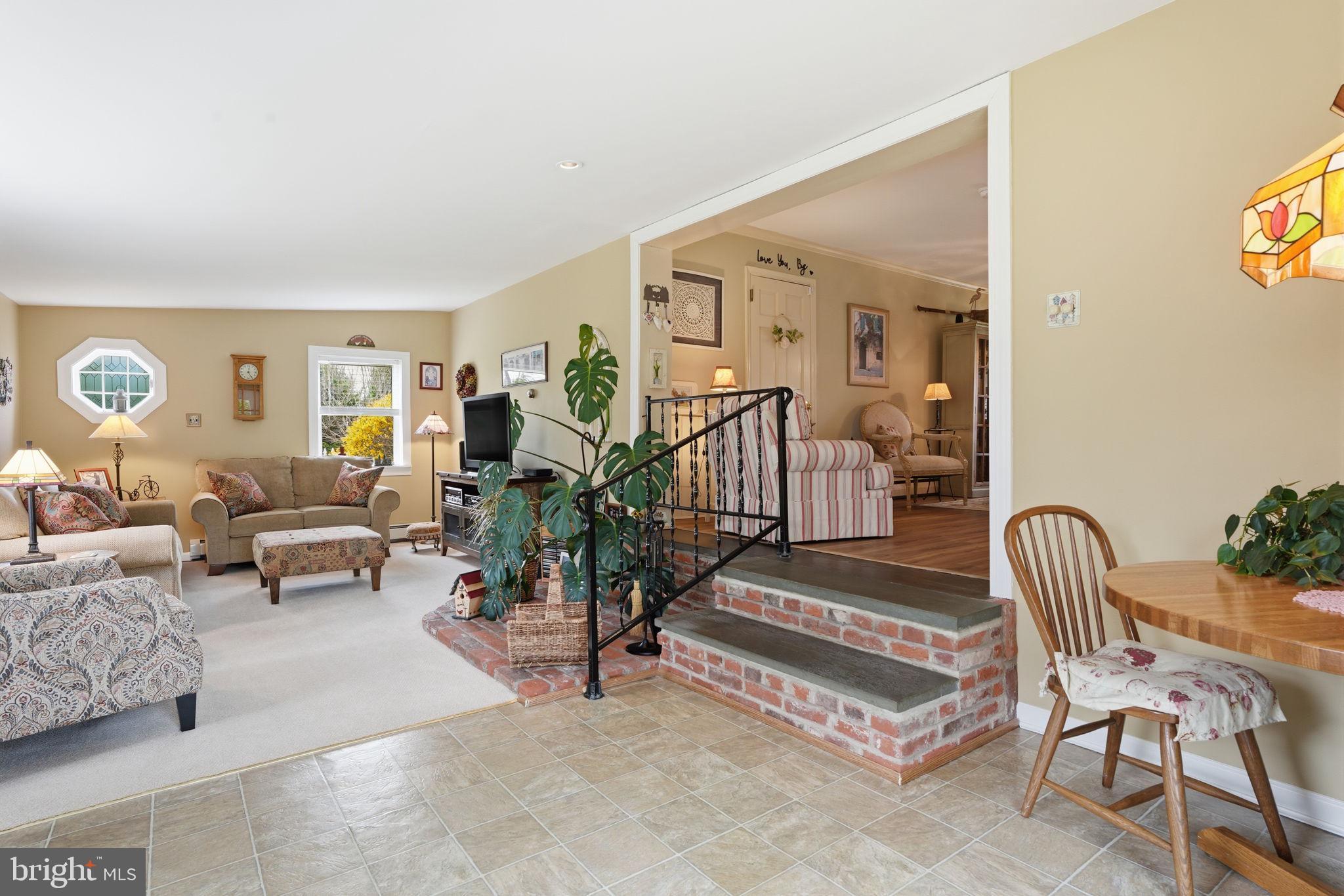 211 Longview Avenue Langhorne, PA 19047 - Photo 23 of 62 a living room with furniture and a potted plant
