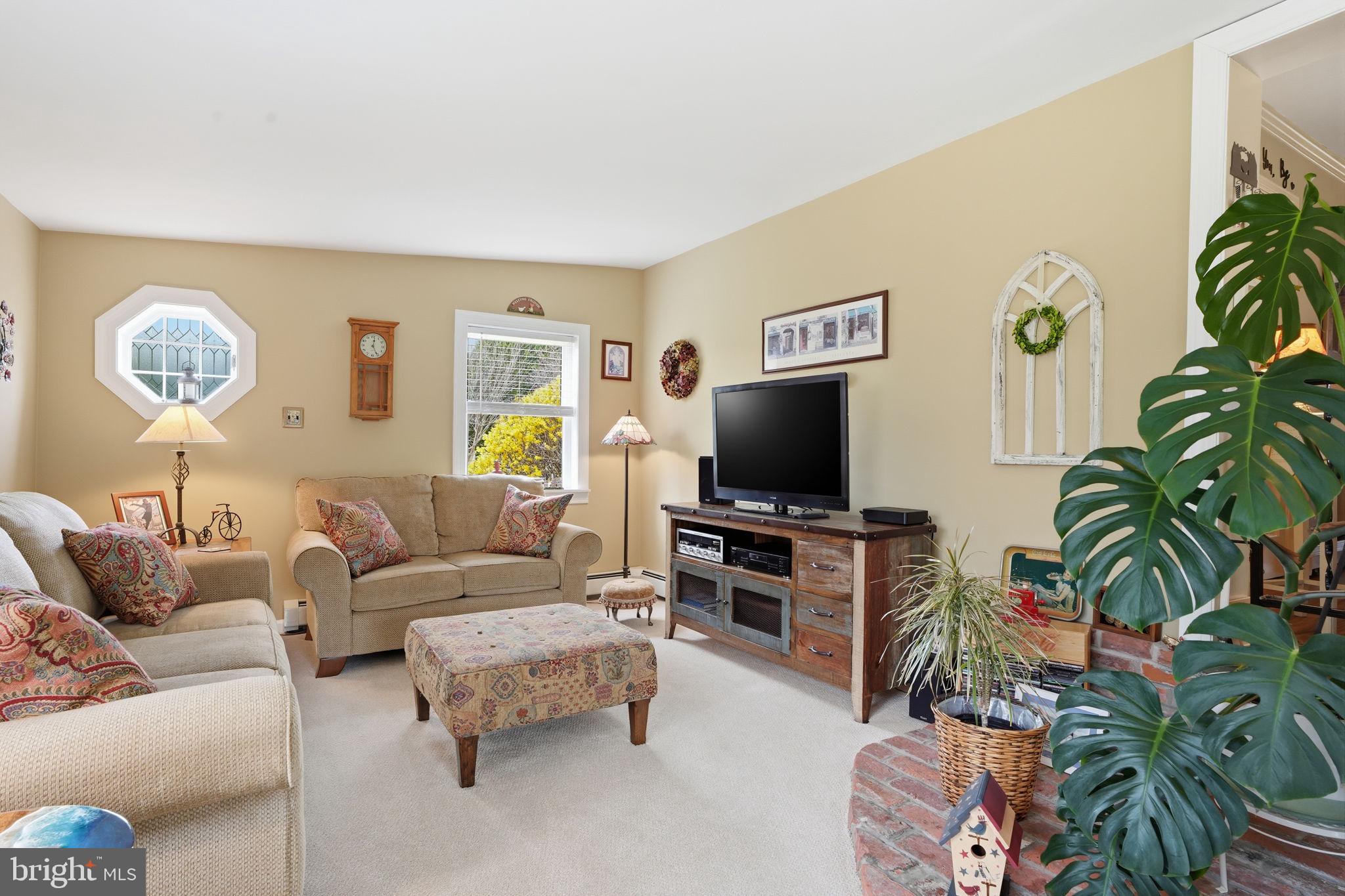 211 Longview Avenue Langhorne, PA 19047 - Photo 24 of 62 a living room with furniture and a flat screen tv