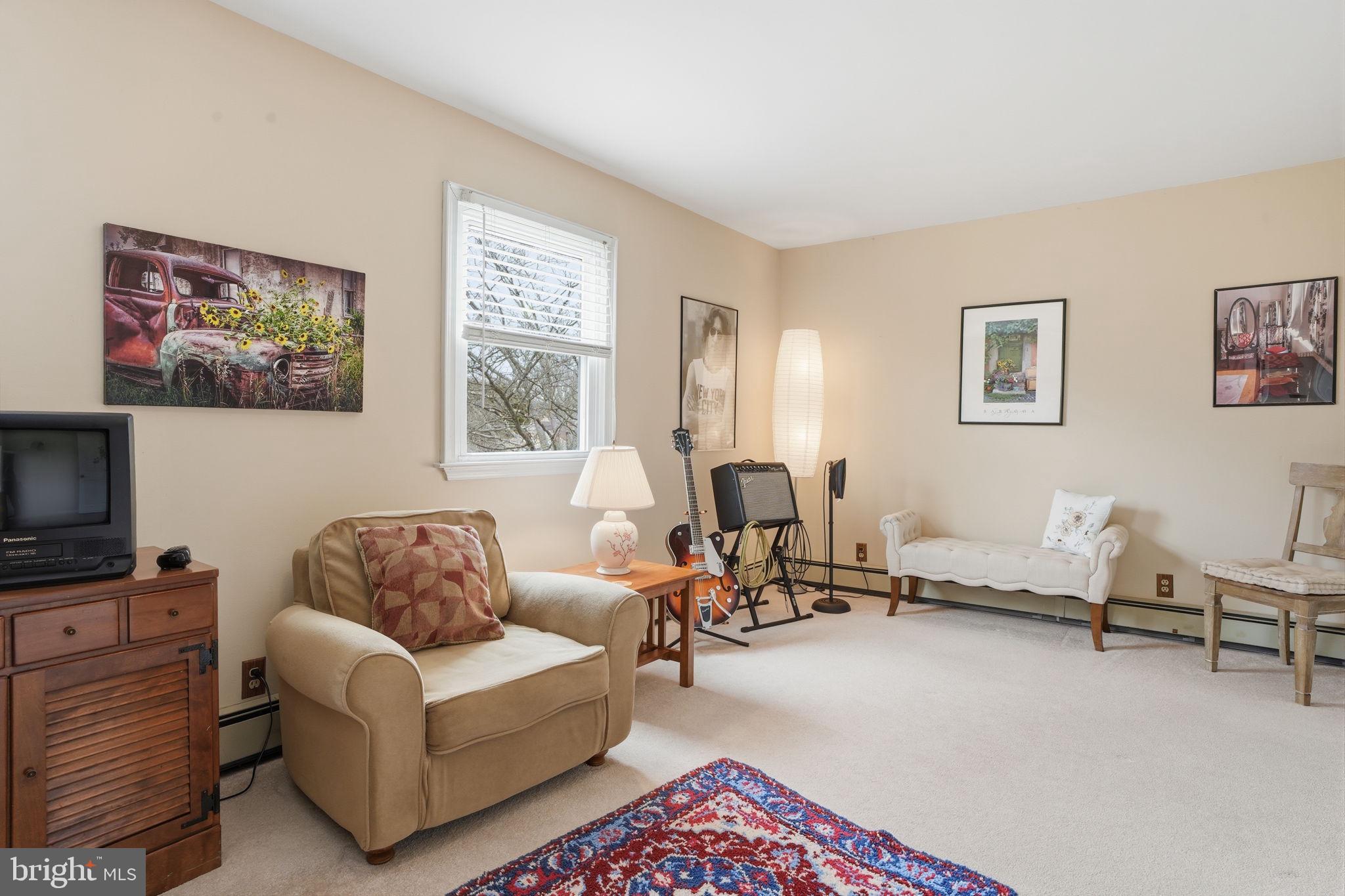 211 Longview Avenue Langhorne, PA 19047 - Photo 26 of 62 a living room with furniture and a flat screen tv