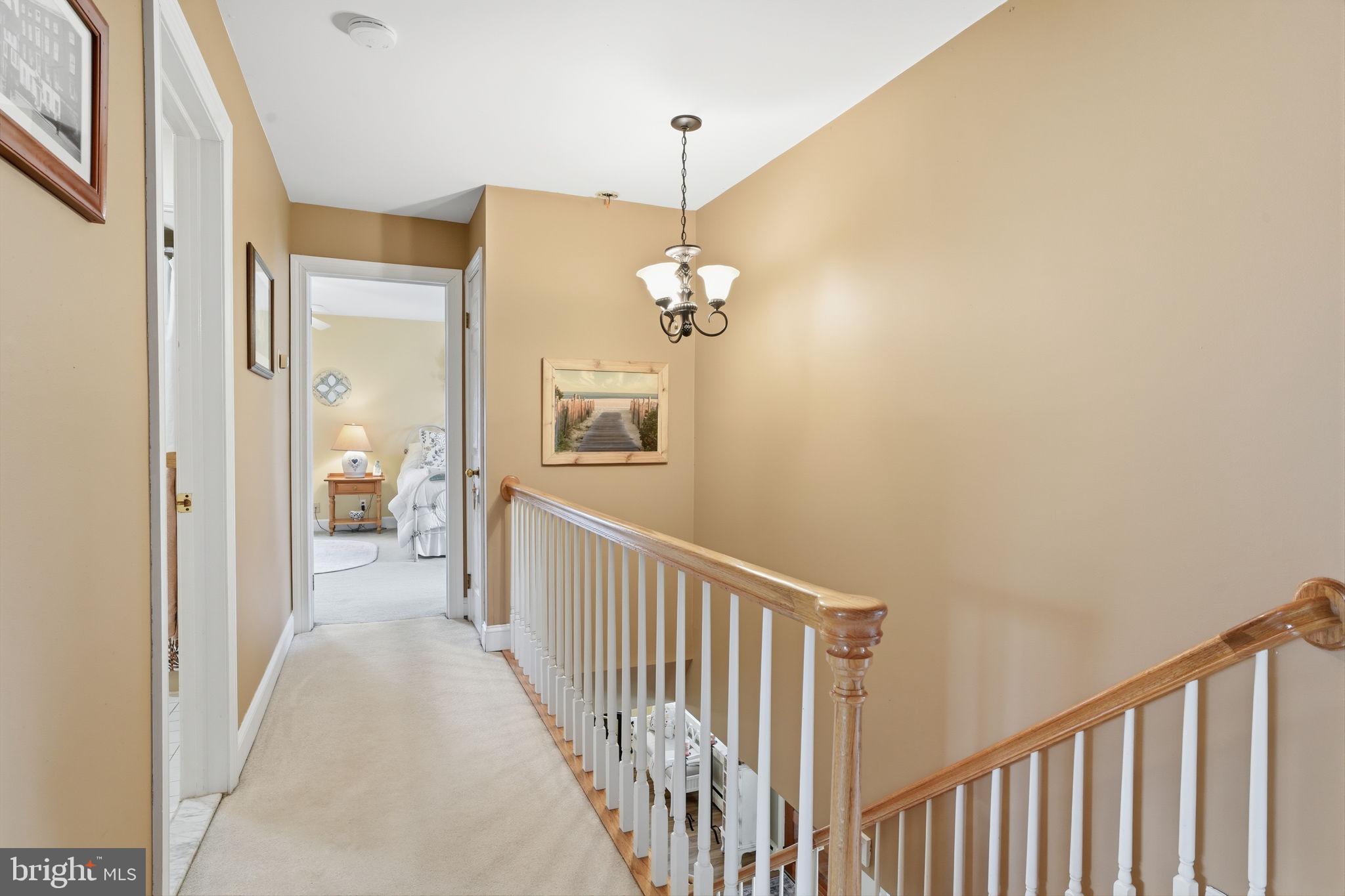 211 Longview Avenue Langhorne, PA 19047 - Photo 27 of 62 a view of a hallway view with wooden floor and staircase