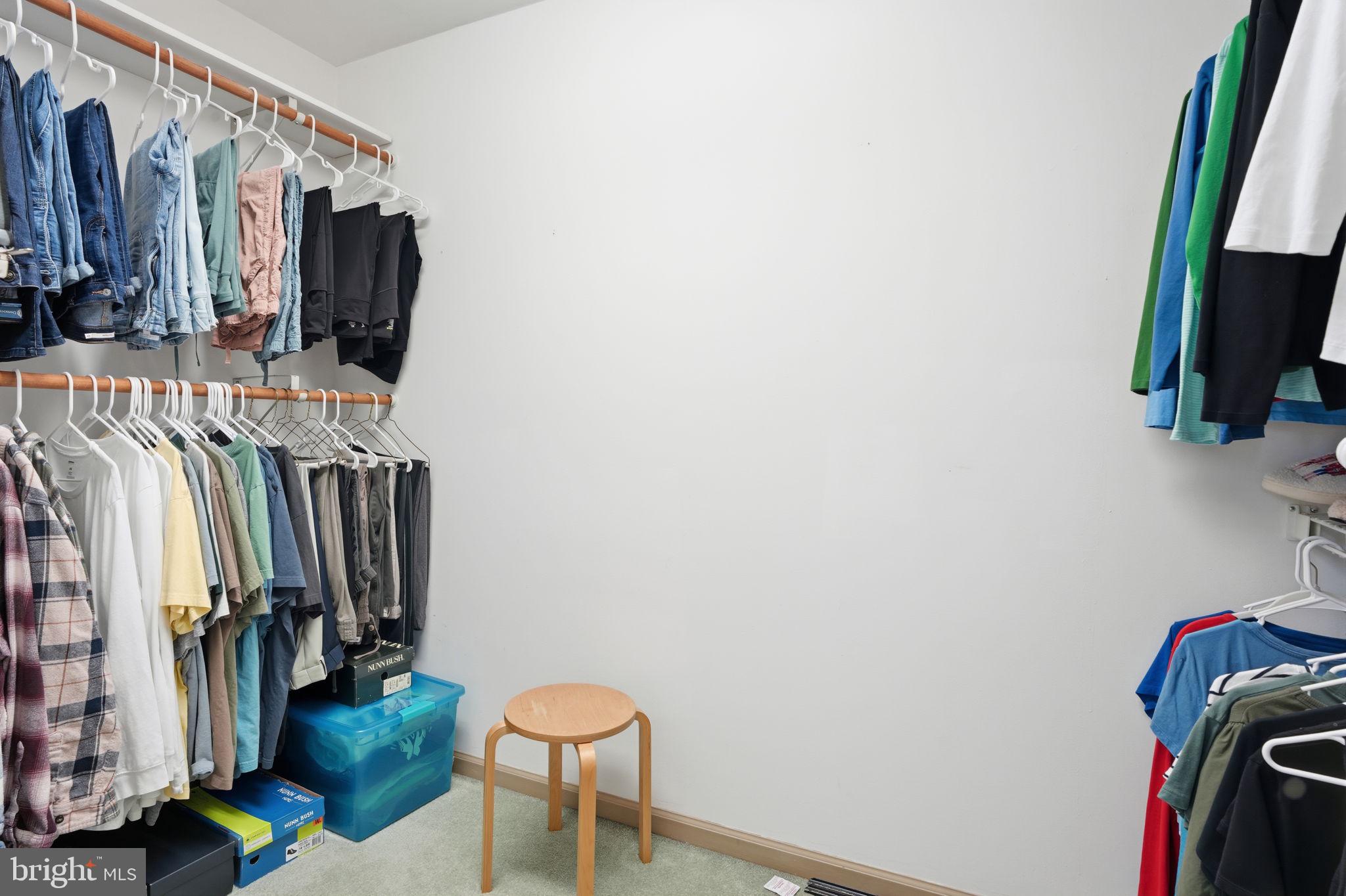 211 Longview Avenue Langhorne, PA 19047 - Photo 32 of 62 a view of walk in closet with clothes and shoes