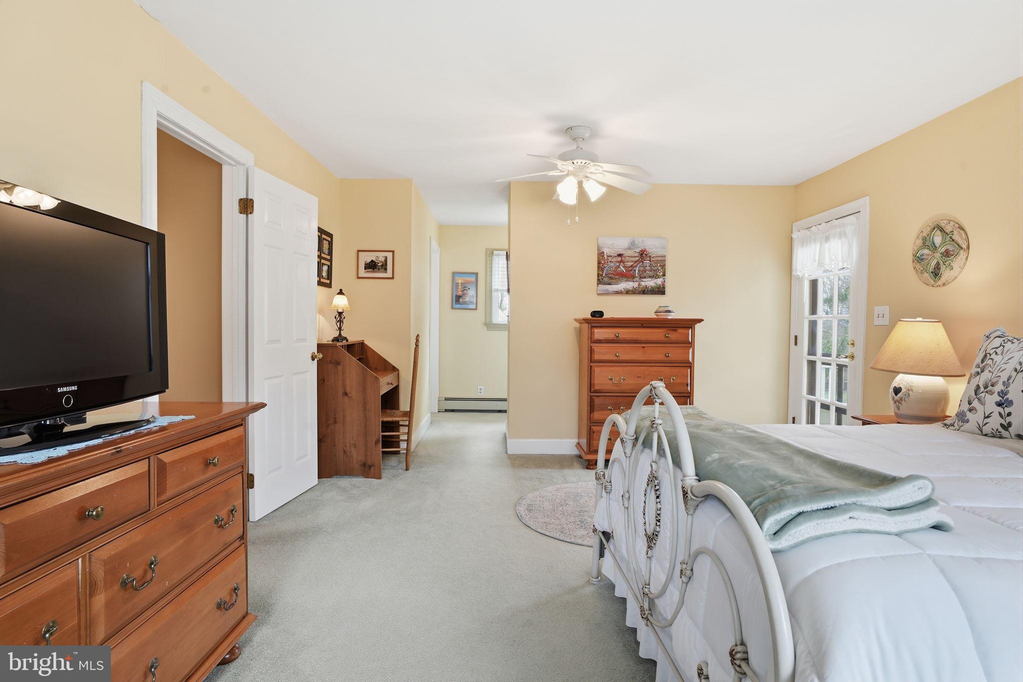 211 Longview Avenue Langhorne, PA 19047 - Photo 33 of 62 a bedroom with furniture and a flat screen tv