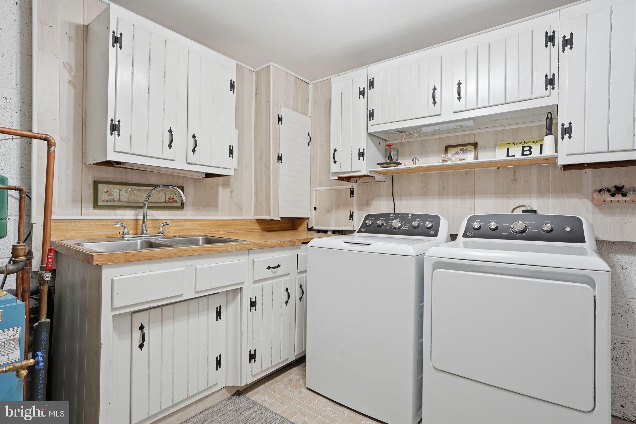 211 Longview Avenue Langhorne, PA 19047 - Photo 37 of 62 a kitchen with cabinets appliances a sink and a cabinets