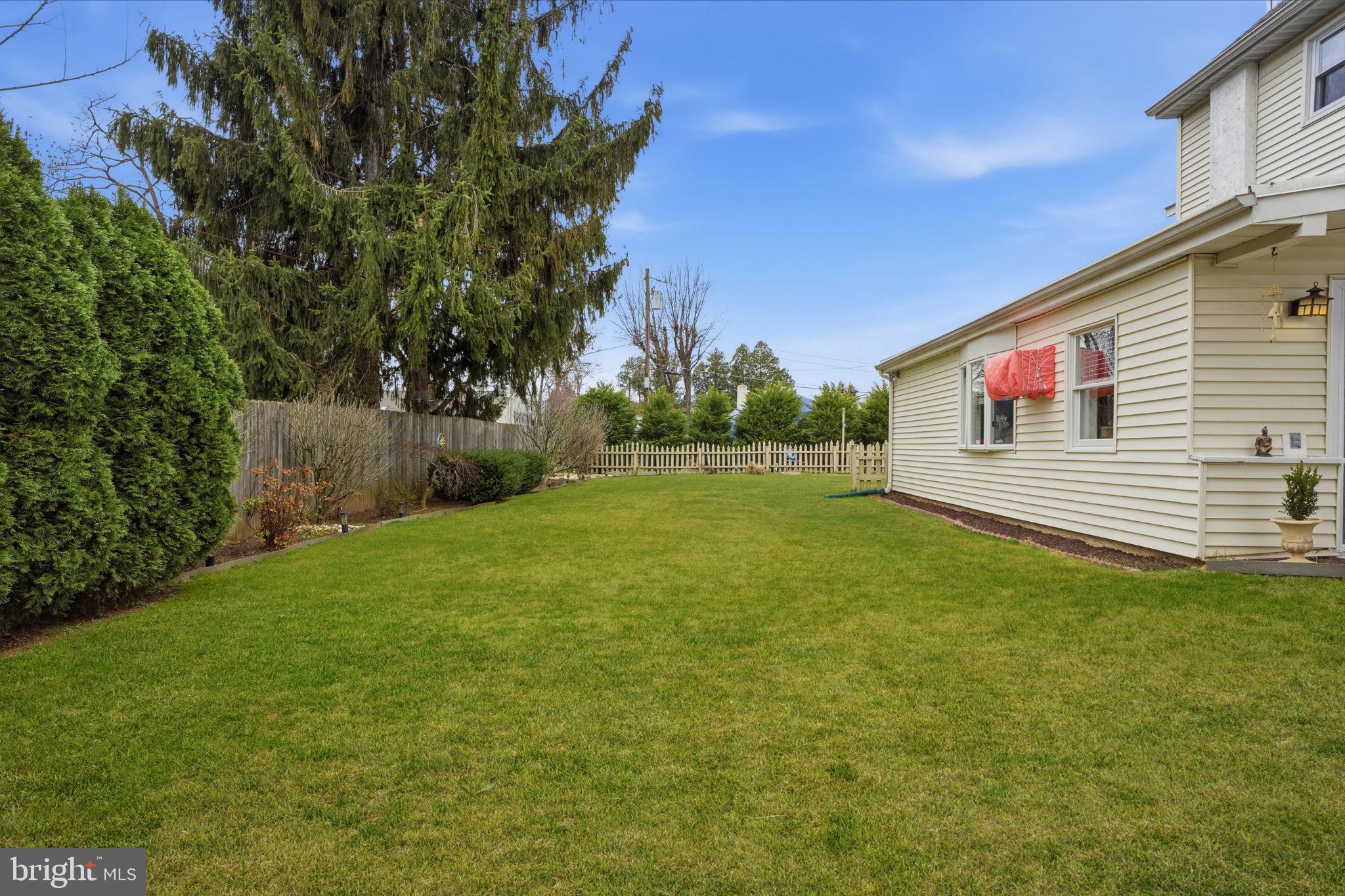 211 Longview Avenue Langhorne, PA 19047 - Photo 40 of 62 Spacious green yard with serene views.