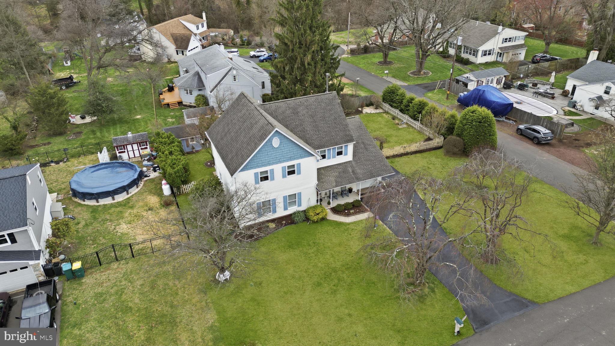 211 Longview Avenue Langhorne, PA 19047 - Photo 49 of 62 an aerial view of a house with a garden and swimming pool