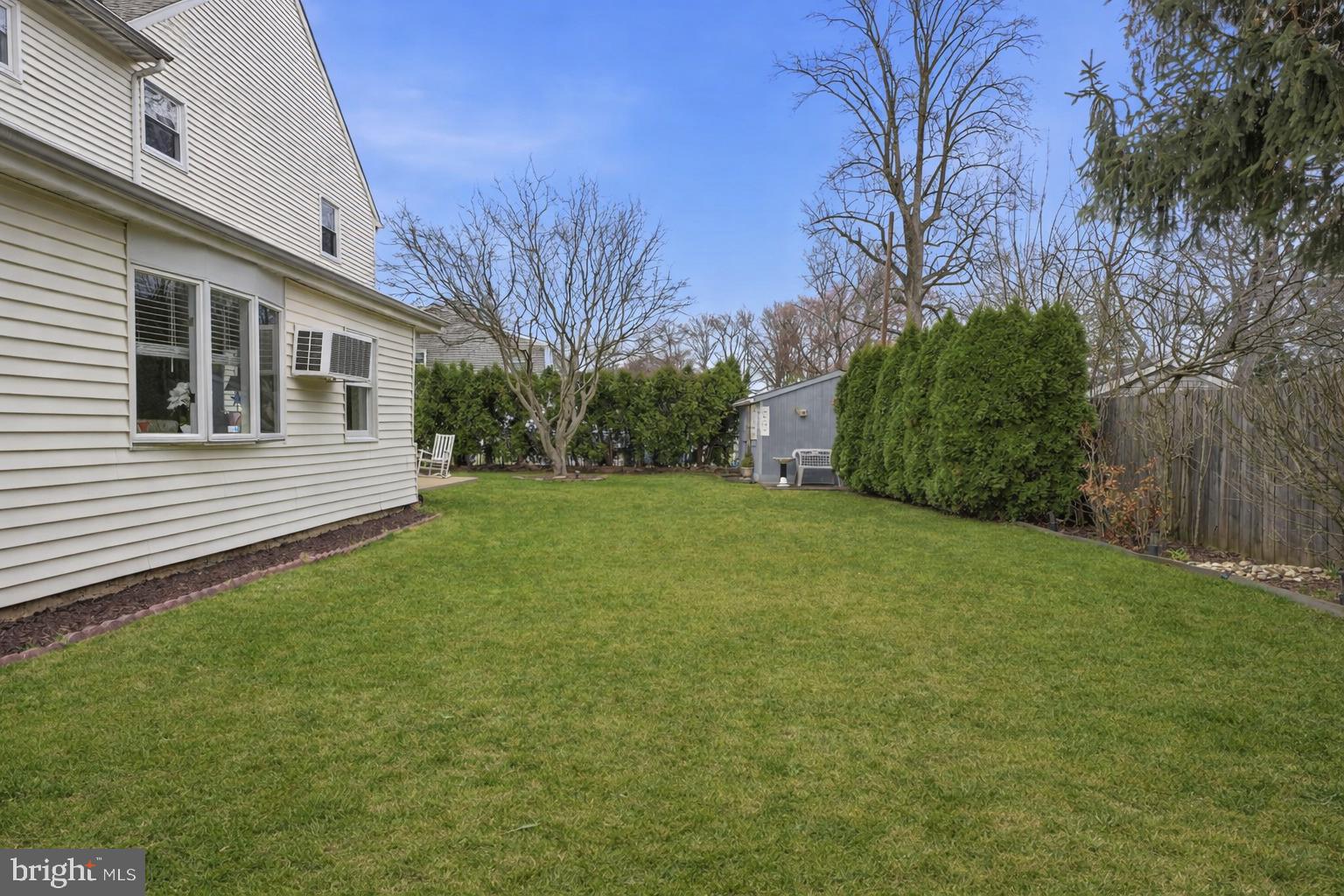 211 Longview Avenue Langhorne, PA 19047 - Photo 56 of 62 a view of a backyard with large trees