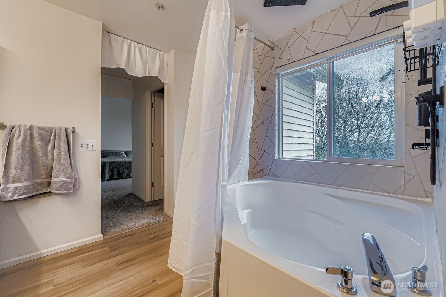 4109 South 220th Place, Unit 18 Kent, WA 98032 - Photo 20 of 29 a bathroom with a bathtub and a shower