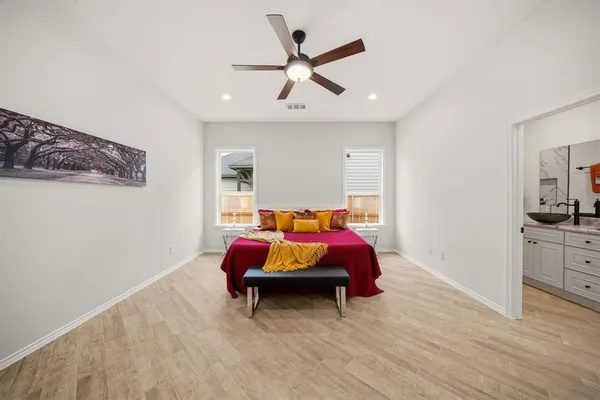 a bedroom with furniture and bed
