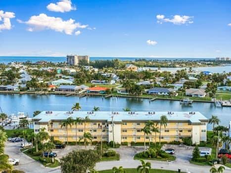 1351 Bayshore Drive, Unit 101 Fort Pierce, FL 34949 - Photo 2 of 37 a view of a city