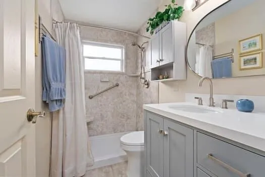 a view of a lake with a building and trees in the background