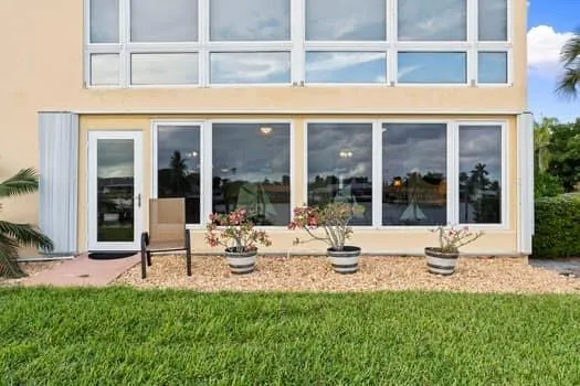 a view of a chairs on the deck