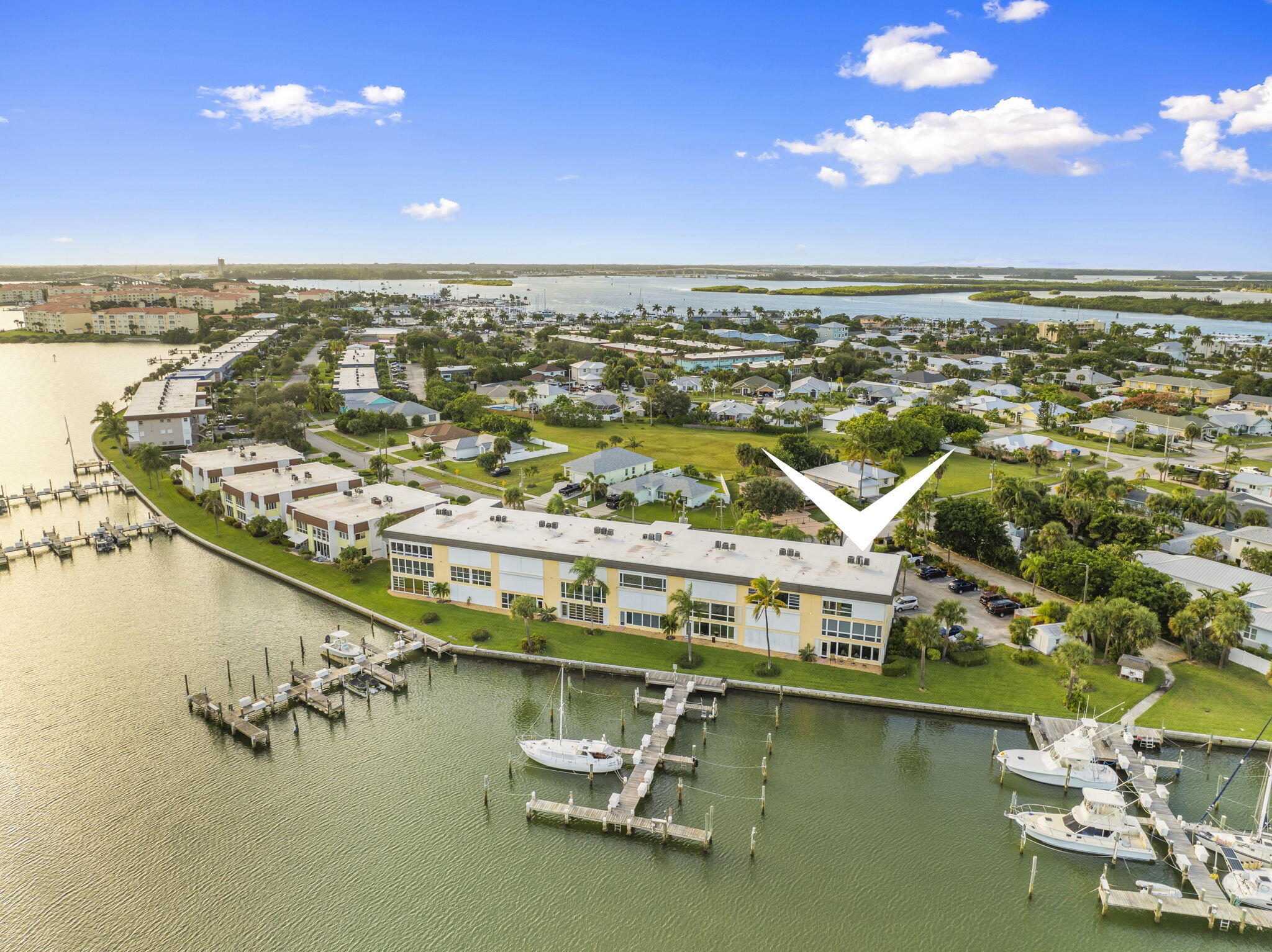 1351 Bayshore Drive, Unit 101 Fort Pierce, FL 34949 - Photo 37 of 37 an aerial view of residential houses with outdoor space