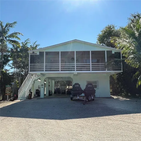 a view of a house with a patio