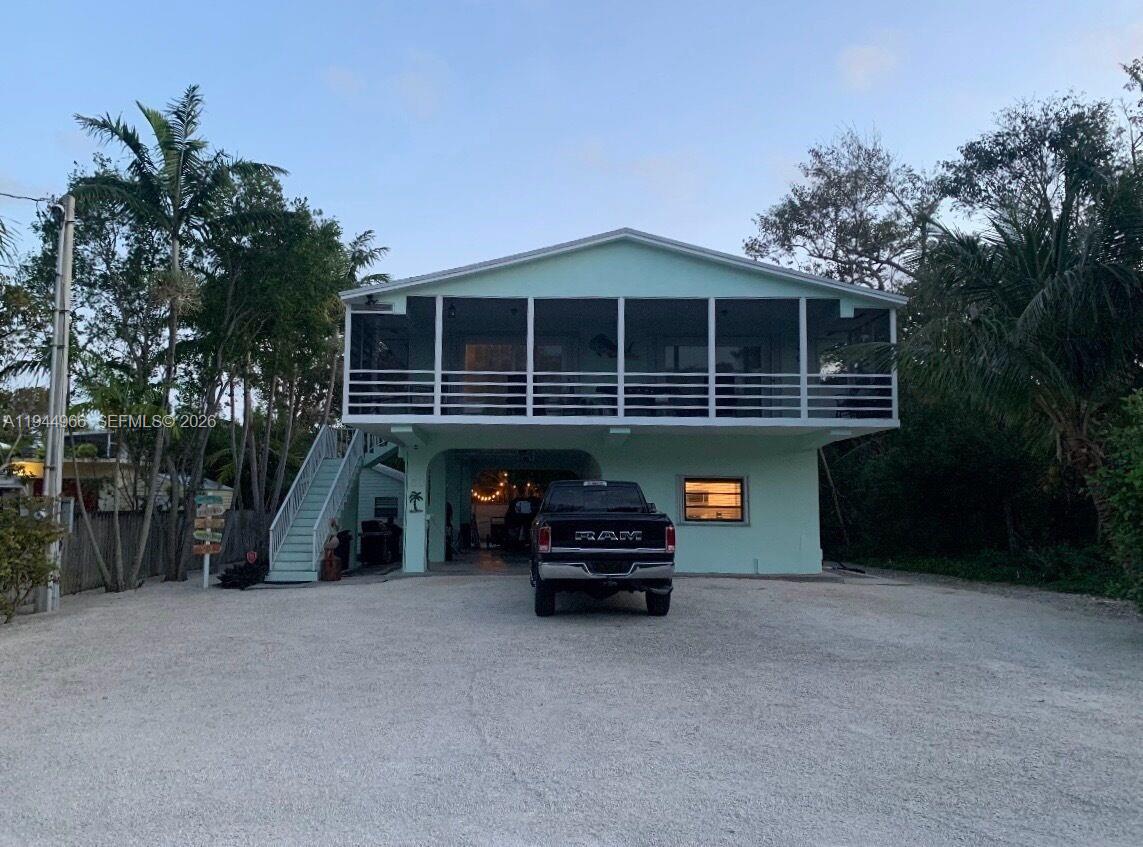 a view of a car parked in garage