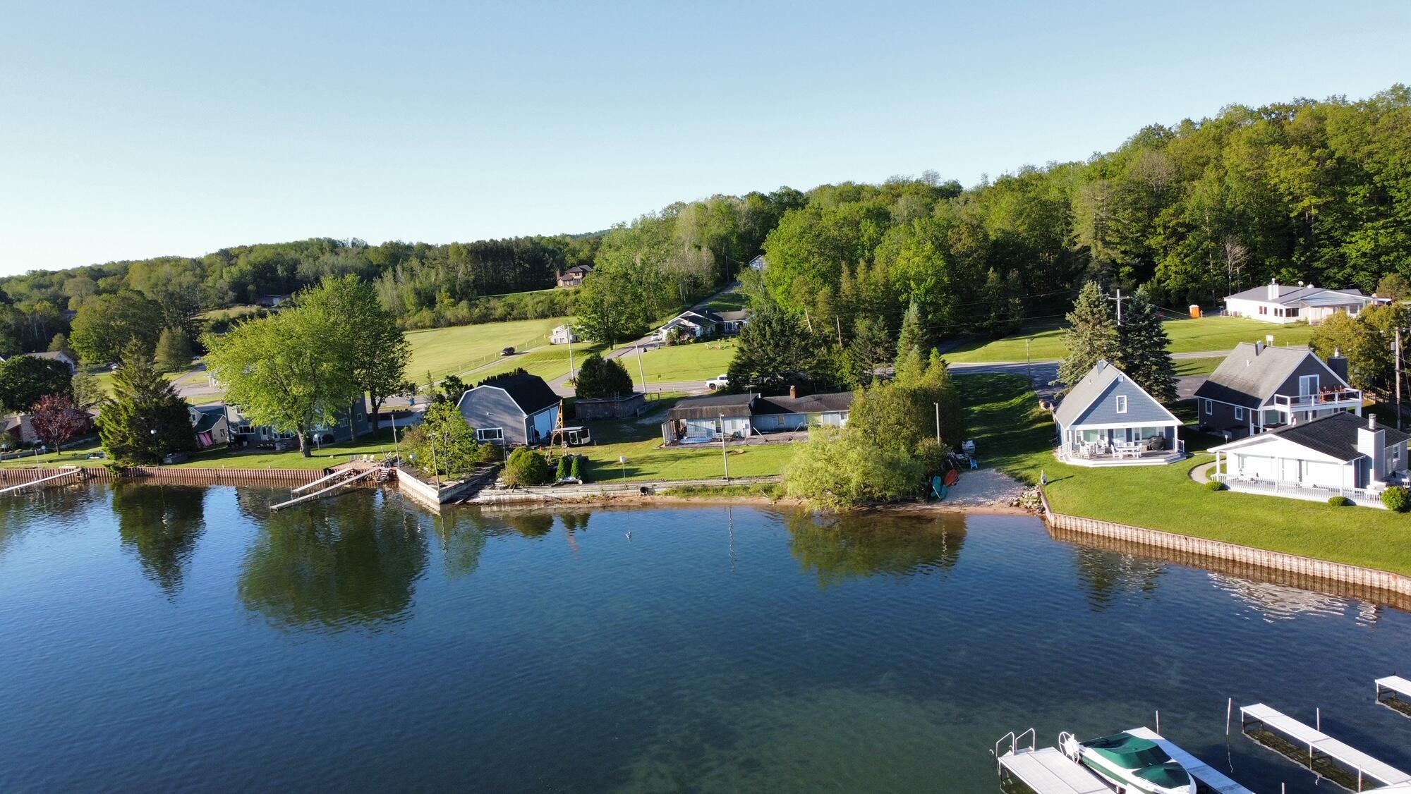 4472 Crescent Beach Road Onekama, MI 49675 - Photo 22 of 38 dji_fly_20240530_074612_429_171706958172