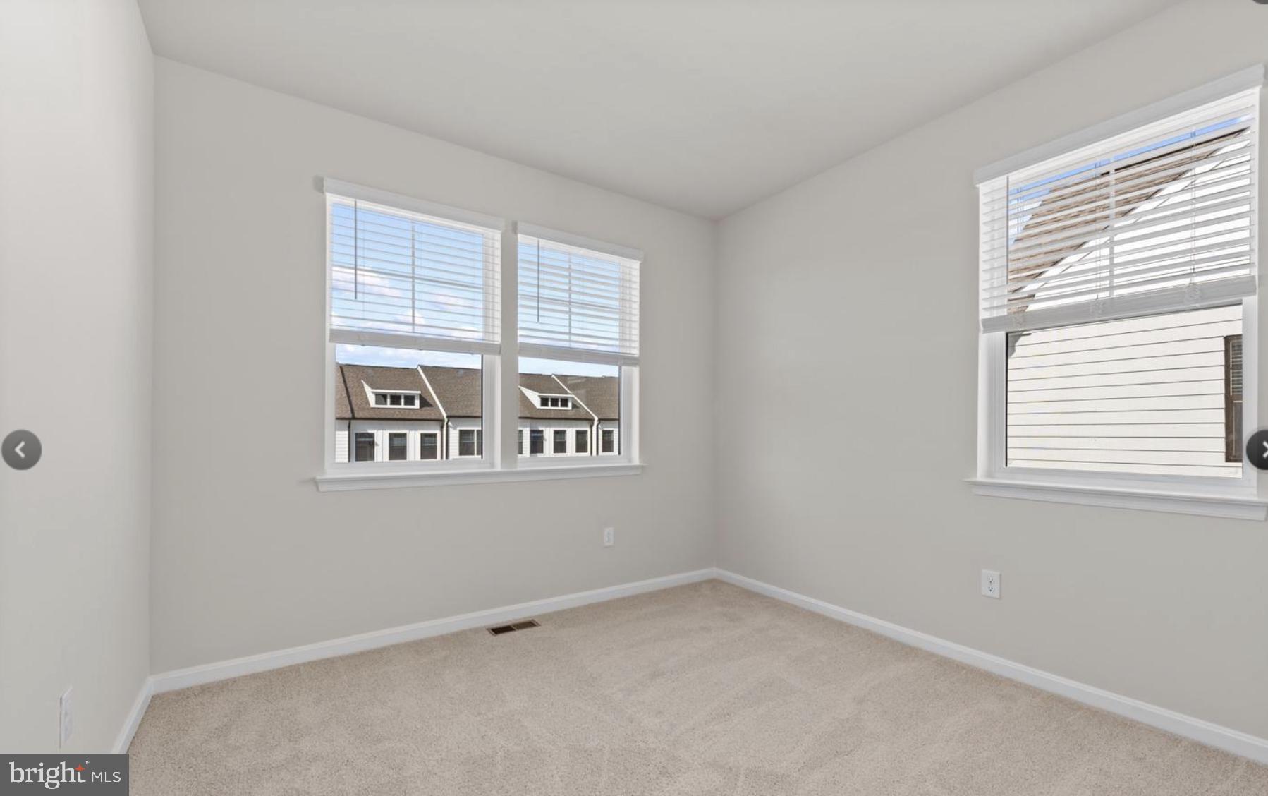 329 Ensemble Way Frederick, MD 21701 - Photo 12 of 20 an empty room with windows