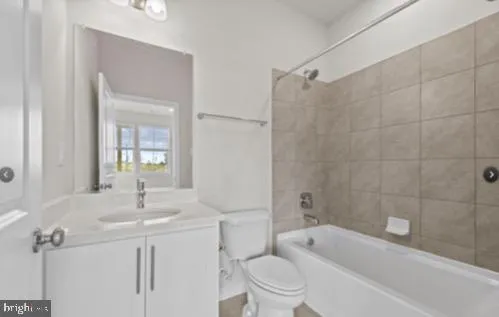 a bathroom with a toilet sink shower and bathtub