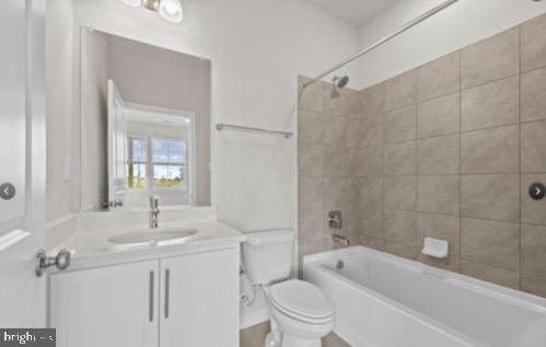 329 Ensemble Way Frederick, MD 21701 - Photo 15 of 20 a bathroom with a toilet sink shower and bathtub