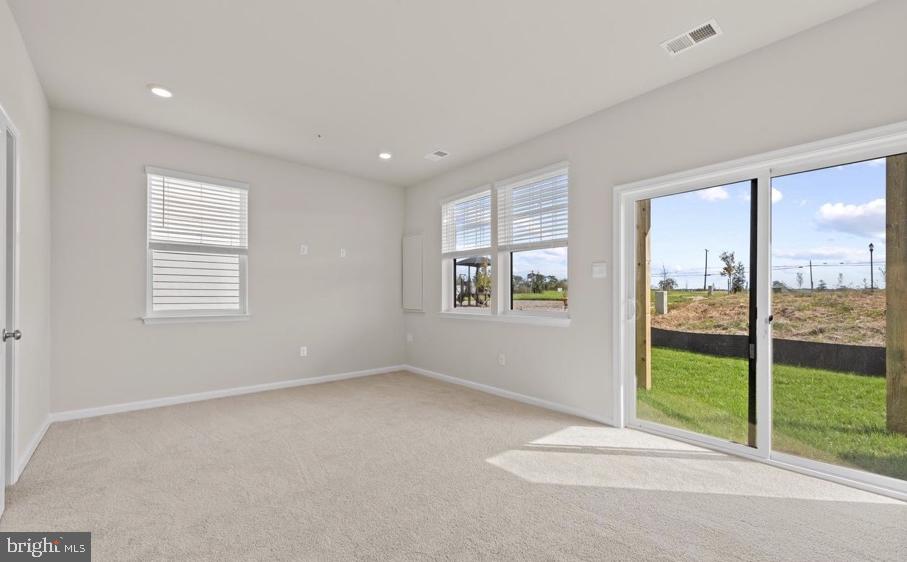 329 Ensemble Way Frederick, MD 21701 - Photo 6 of 20 a view of an empty room with a window