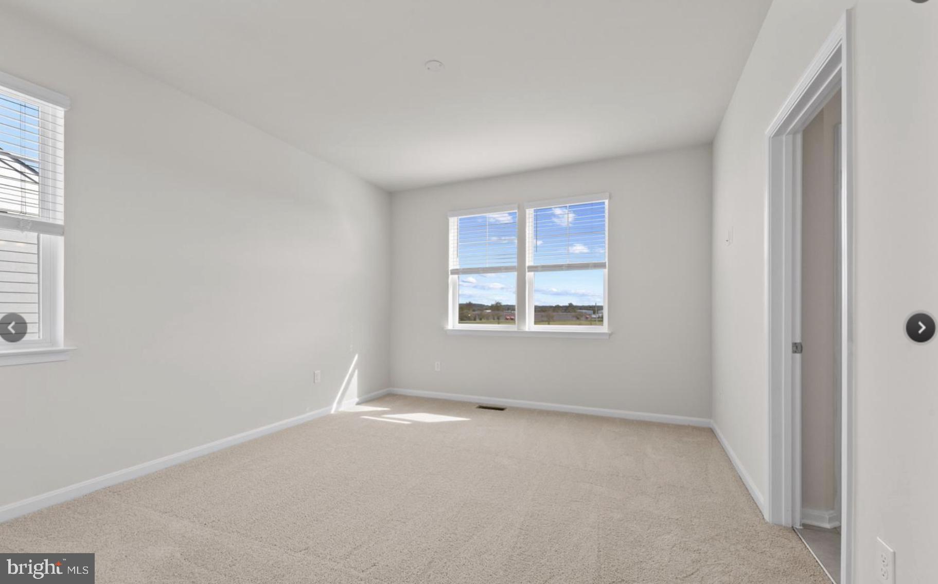 329 Ensemble Way Frederick, MD 21701 - Photo 8 of 20 an empty room with windows