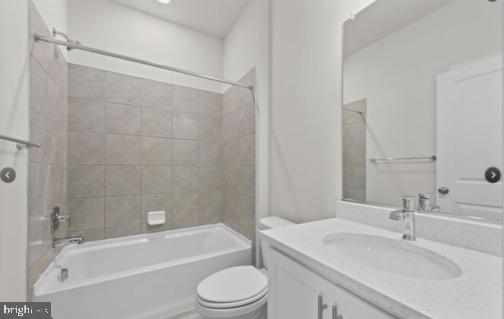 329 Ensemble Way Frederick, MD 21701 - Photo 10 of 20 a bathroom with a bathtub shower sink vanity mirror and toilet